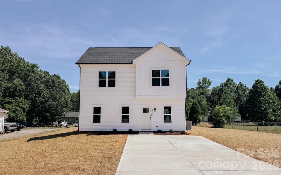 Front exterior of a new home in , Salisbury, NC, highlighting curb appeal (Image 14).