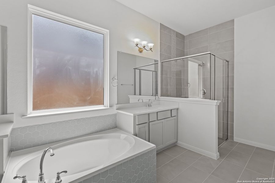 Furnished interior view inside a new home in Homestead 65', Schertz (Image 8).