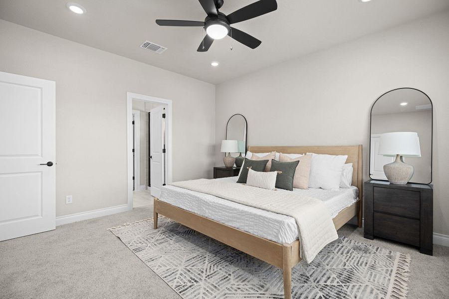 Bedroom featuring recessed lighting, light carpet, and ceiling fan