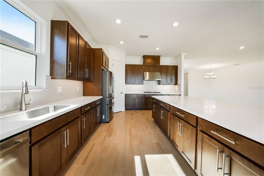Furnished interior view inside a new home in Esplanade at Skye Ranch, Sarasota (Image 29).