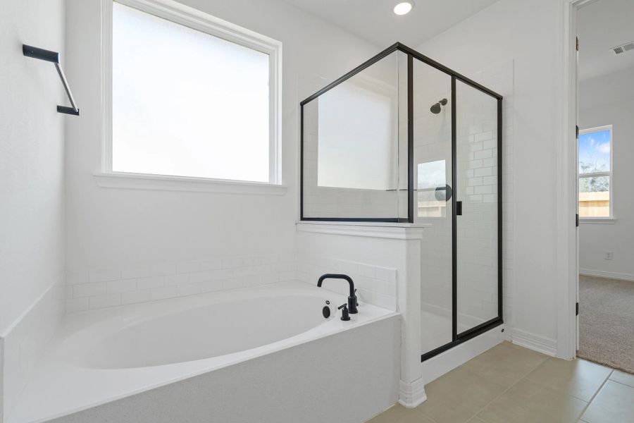 Primary bath. Note: Sample product photo. Actual exterior and interior selections may vary by homesite. Photo may be virtually staged