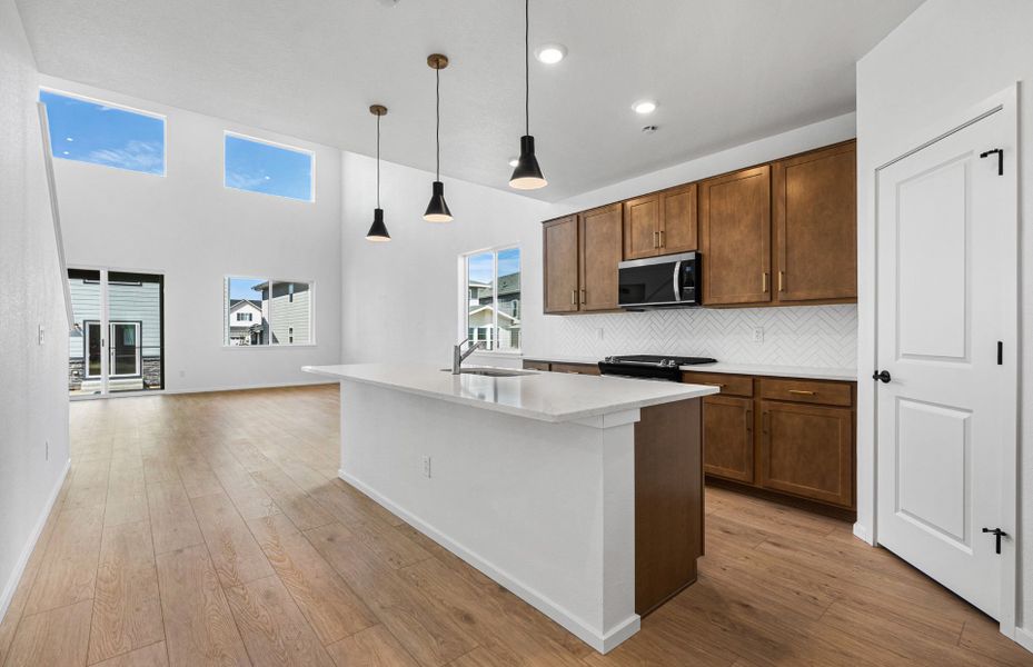 Furnished interior view inside a new home in Harvest Crossing, Aurora (Image 5).