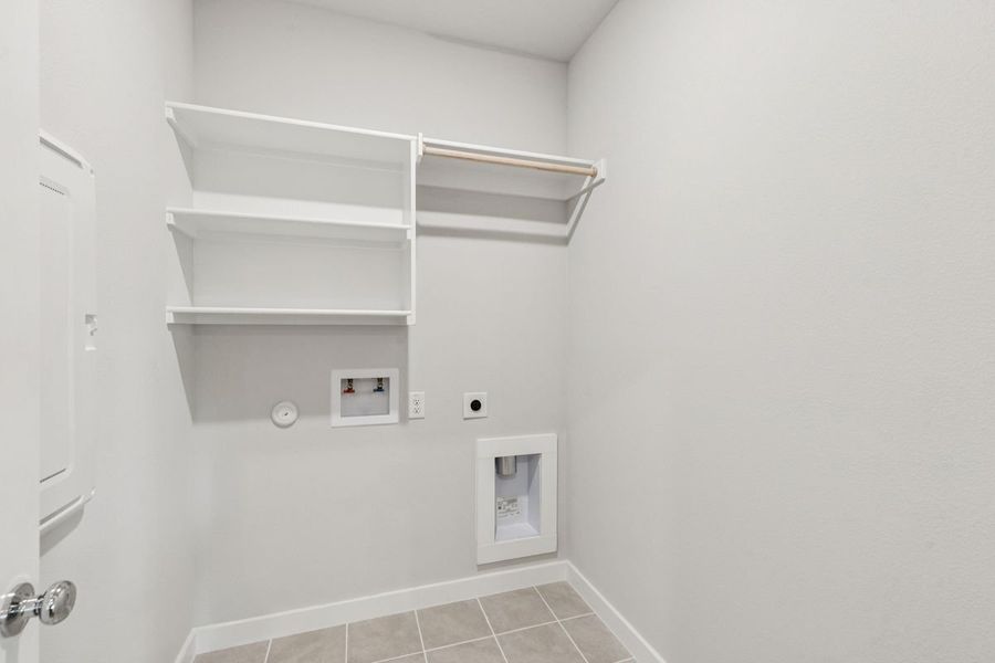 Utility Room in the Oscar home plan by Trophy Signature Homes – REPRESENTATIVE PHOTO Utility Room in the Oscar home plan by Trophy Signature Homes – REPRESENTATIVE PHOTO