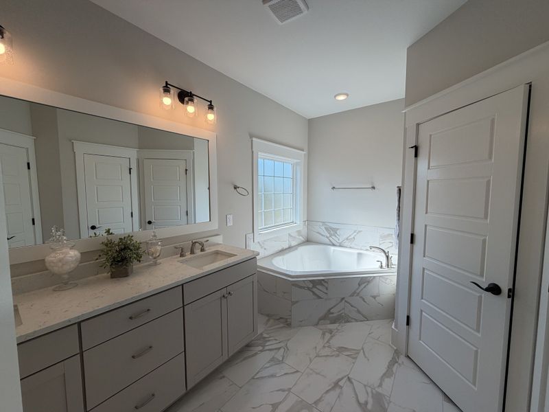 Furnished interior view inside a new home in The Sanctuary at Sunset Beach, Sunset Beach (Image 15).