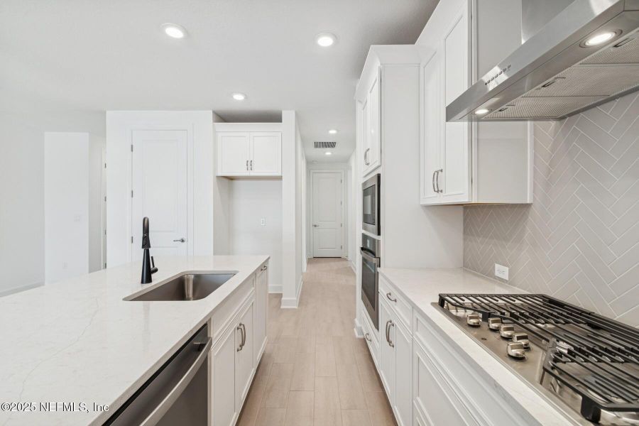 Furnished interior view inside a new home in Evergreen Island at Silverleaf - Classic, St. Augustine (Image 9).
