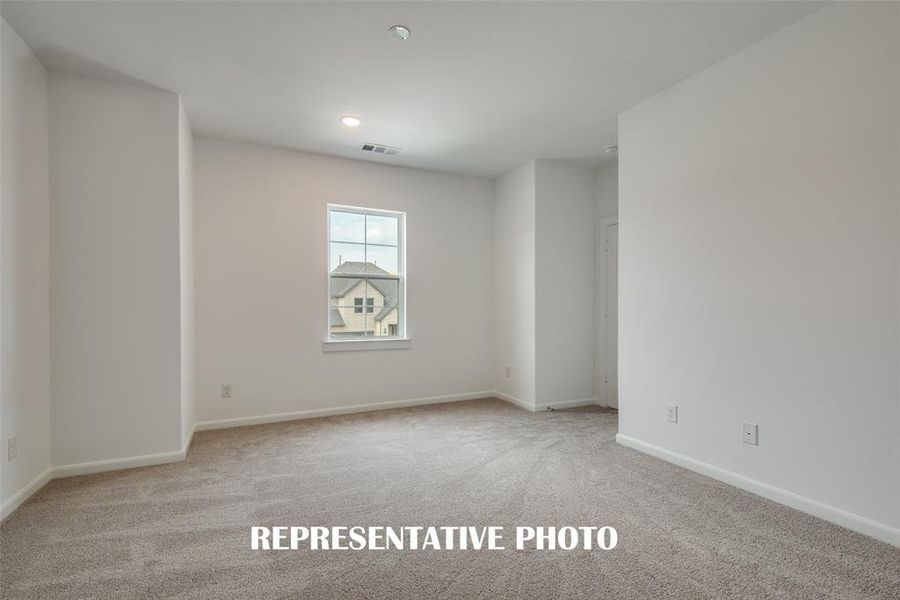 One of several nicely sized, light filled secondary bedrooms.  REPRESENTATIVE PHOTO