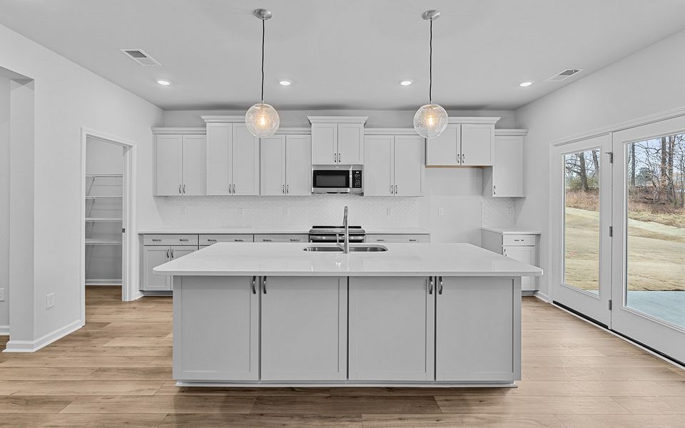 Furnished interior view inside a new home in Fieldstone, Lexington (Image 8).