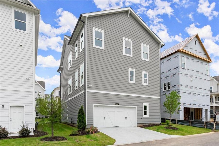 Front exterior of a new home in West Town, Atlanta, GA, highlighting curb appeal (Image 23).