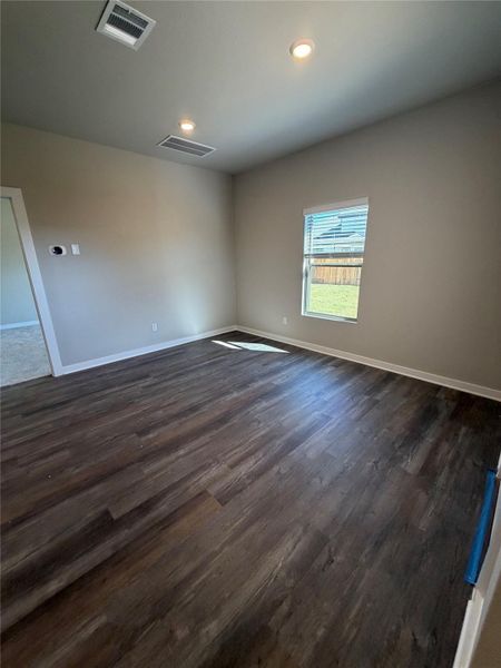 Spacious, unfurnished interior of a new home in Riverbend at Double Eagle, Cedar Creek (Image 13).