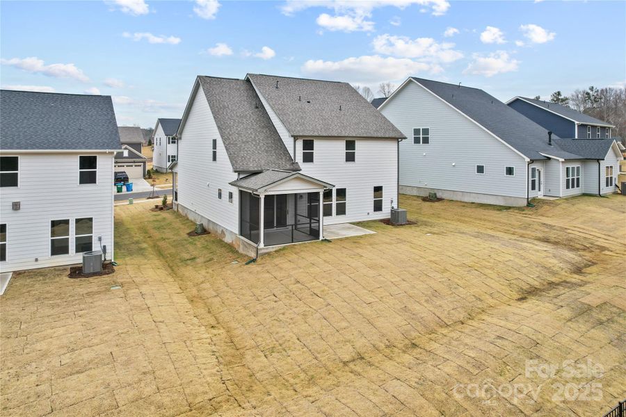 Exterior details and patio area of a home in Forest Creek, Waxhaw (Image 24).