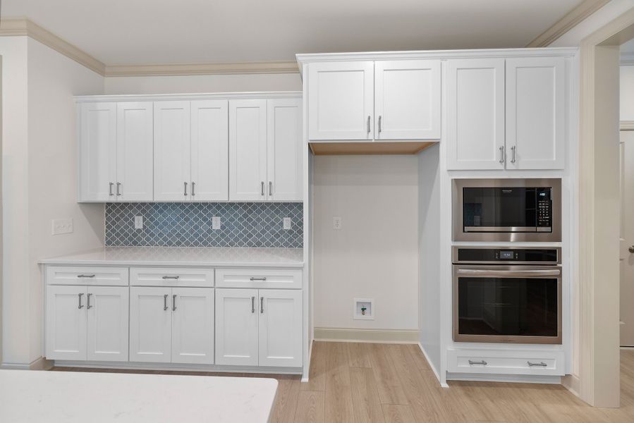 Representative furnished interior of a home built from the The Hampton by RobuckHomes in Baylee Ridge, Selma (Image 123).