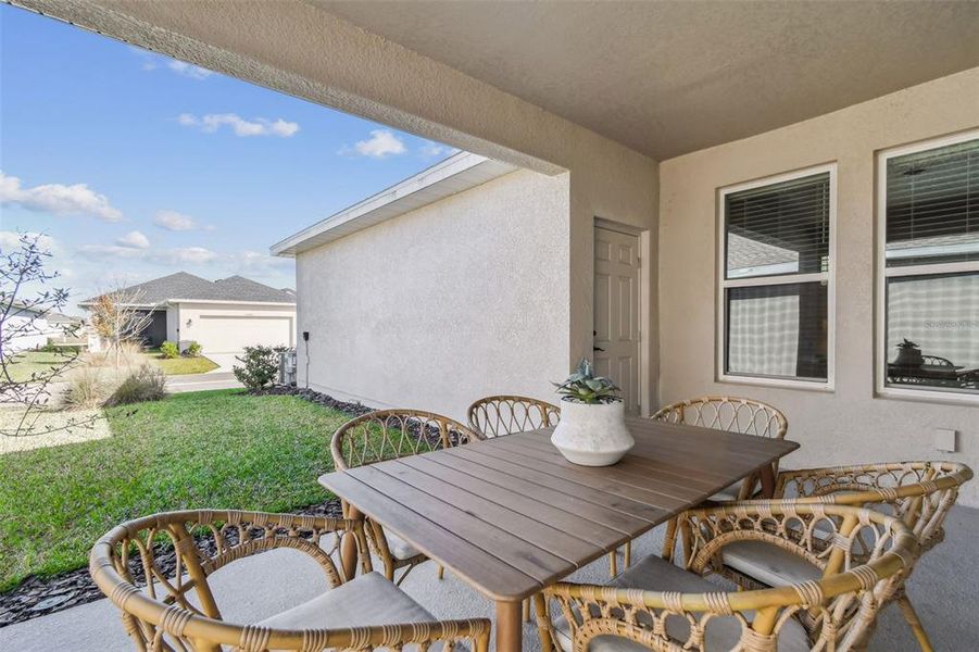 Exterior details and patio area of a home in Persimmon Park - Cottage Series, Wesley Chapel (Image 22). Exterior details and patio area of a home in Persimmon Park - Cottage Series, Wesley Chapel (Image 22).