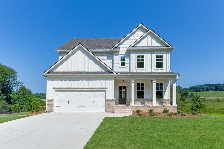 Front exterior of a new home in , Jefferson, GA, highlighting curb appeal (Image 1).