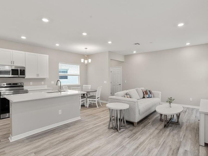 Enjoy a sunny, open living area - Donatella bungalow by Highland Homes