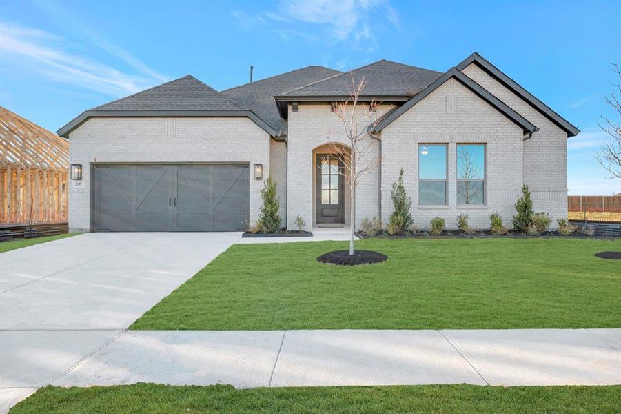 Front exterior of a new home in Myrtle Creek, Waxahachie, TX, highlighting curb appeal (Image 1). Front exterior of a new home in Myrtle Creek, Waxahachie, TX, highlighting curb appeal (Image 1).