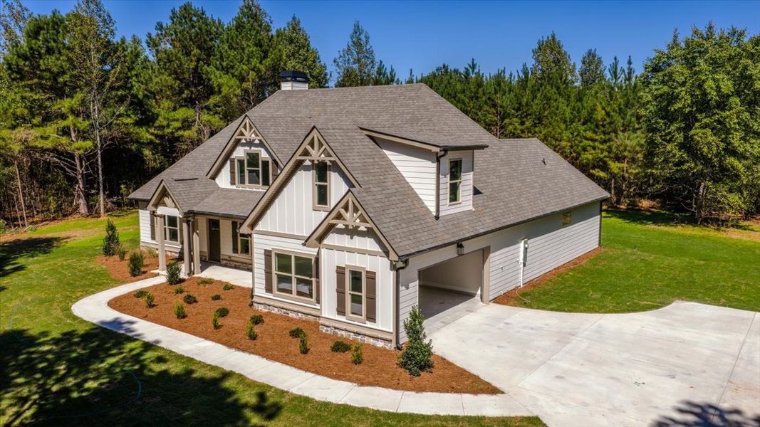 Front exterior of a new home in White Oaks, The Rock, GA, highlighting curb appeal (Image 2).