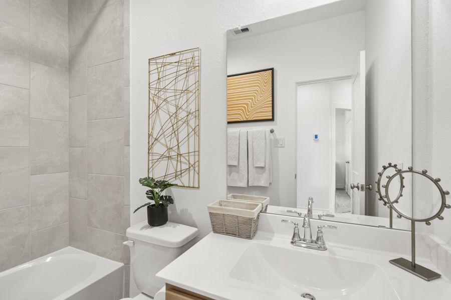 Furnished interior view inside a new home in Meridiana, Manvel (Image 12).