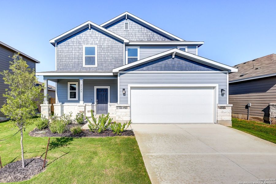 Front exterior of a new home in Hiddenbrooke, Seguin, TX, highlighting curb appeal (Image 2). Front exterior of a new home in Hiddenbrooke, Seguin, TX, highlighting curb appeal (Image 2).
