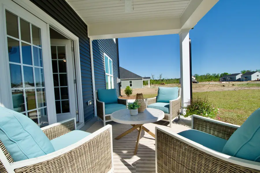 Exterior details and patio area of a home in Patriot’s Watch, Shallotte (Image 2). Exterior details and patio area of a home in Patriot’s Watch, Shallotte (Image 2).