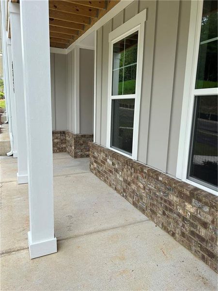 Front exterior of a new home in , Gainesville, GA, highlighting curb appeal (Image 23). Front exterior of a new home in , Gainesville, GA, highlighting curb appeal (Image 23).