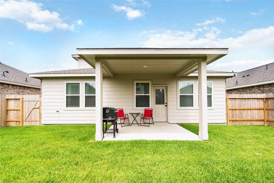 Exterior details and patio area of a home in Ascend at Legends Bay, Baytown (Image 22). Exterior details and patio area of a home in Ascend at Legends Bay, Baytown (Image 22).