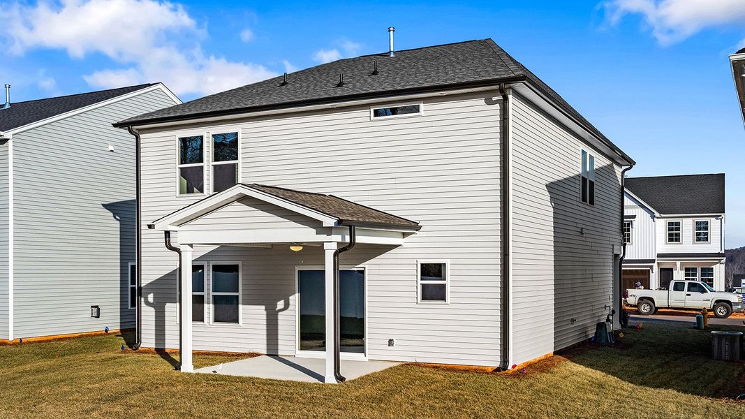 Exterior details and patio area of a home in Hanes Lake, Winston-Salem (Image 3).