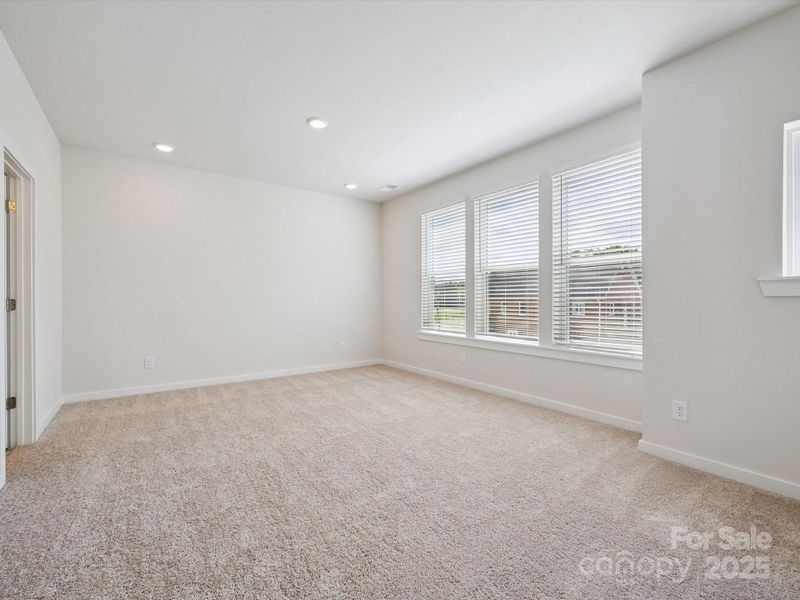 Spacious, unfurnished interior of a new home in Central Living at Craig, Charlotte (Image 15).