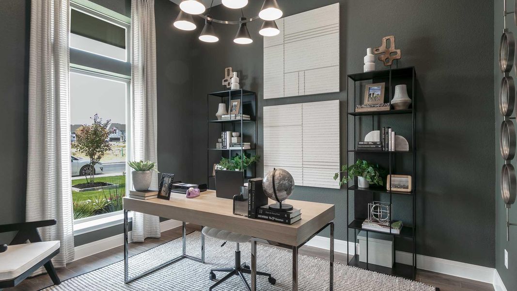 Office area featuring wood finished floors and a chandelier