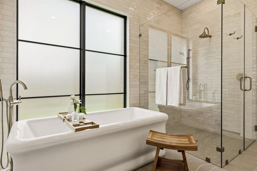 Freestanding tub separate from dual headed standing shower