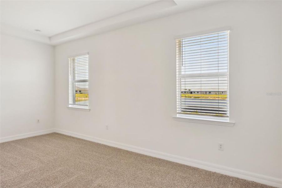 Spacious, unfurnished interior of a new home in Crescent Lakes - Signature Series, Punta Gorda (Image 9).