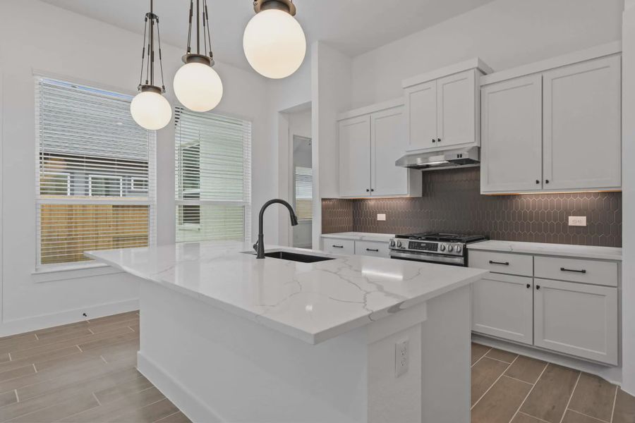 Representative furnished interior of a home built from the Augusta by Chesmar Homes in Riceland Alley Loads, Mont Belvieu (Image 6).