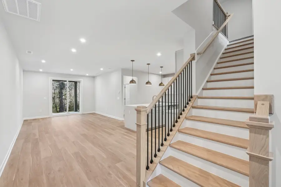Spacious, unfurnished interior of a new home in The Townes at Willow Park, Cary (Image 8).