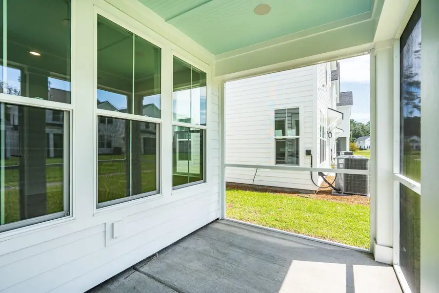 Exterior details and patio area of a home in , Charleston (Image 3). Exterior details and patio area of a home in , Charleston (Image 3).