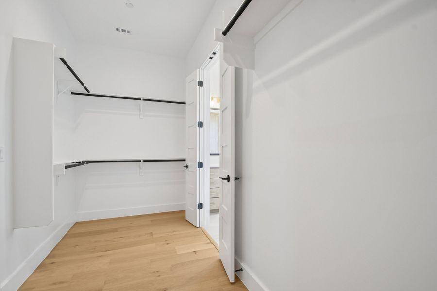 Spacious, unfurnished interior of a new home in Milky Way at River Place, Austin (Image 23).