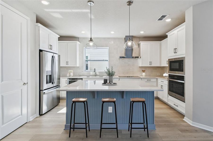 Furnished interior view inside a new home in Weslyn Park in Sunbridge 34', St. Cloud (Image 5).