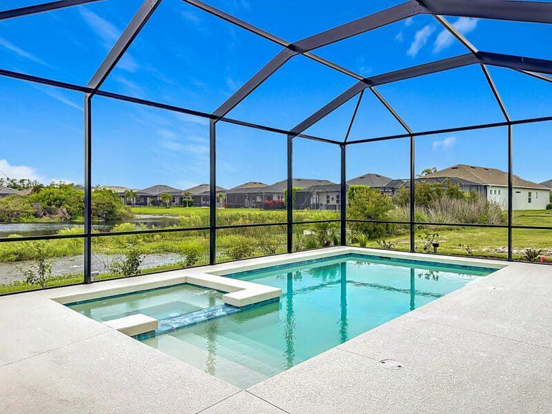 Exterior details and patio area of a home in River Preserve Estates, Parrish (Image 26).