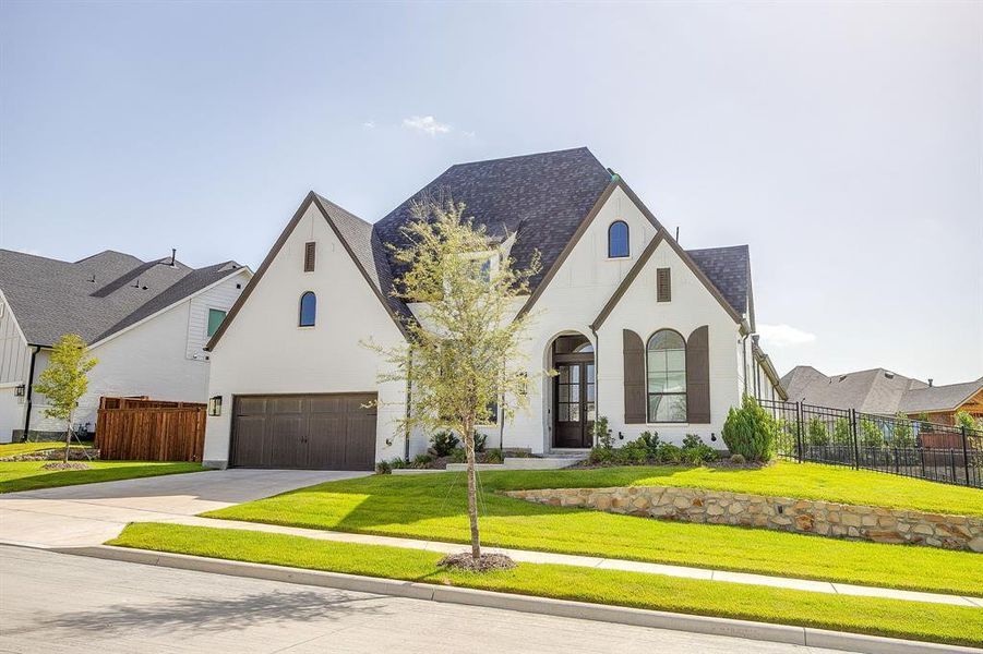 Front exterior of a new home in , Fort Worth, TX, highlighting curb appeal (Image 23). Front exterior of a new home in , Fort Worth, TX, highlighting curb appeal (Image 23).
