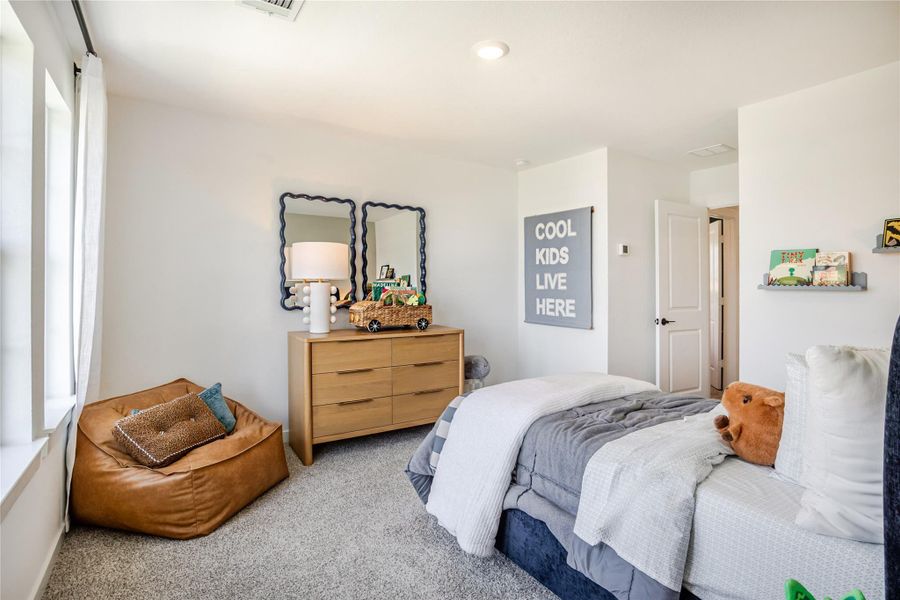 Natural light fills the room, complemented by soft carpeting Natural light fills the room, complemented by soft carpeting