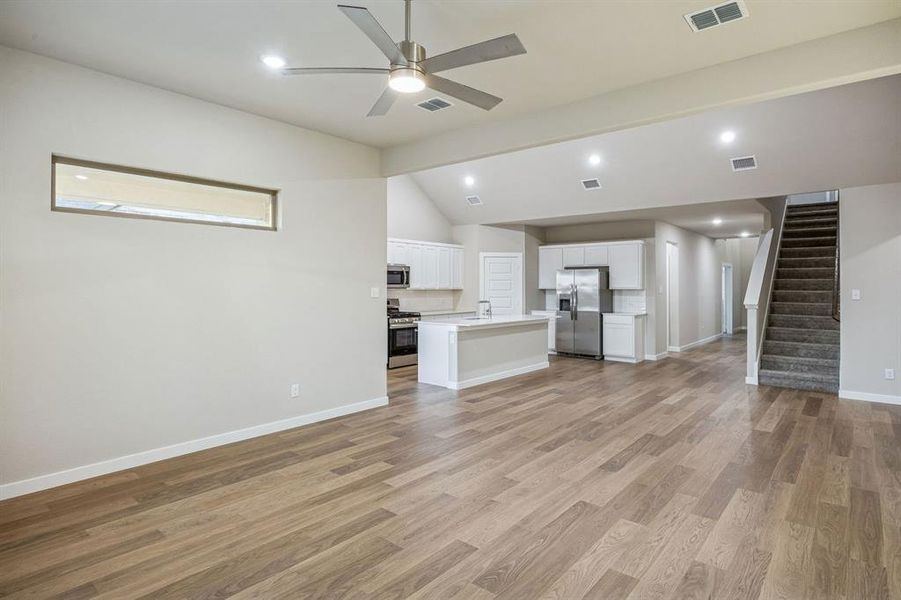 Living Room in the Wimbledon home plan by Trophy Signature Homes – REPRESENTATIVE PHOTO Living Room in the Wimbledon home plan by Trophy Signature Homes – REPRESENTATIVE PHOTO