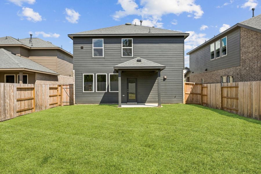 Exterior details and patio area of a home in Saint Tropez, Huffman (Image 4). Exterior details and patio area of a home in Saint Tropez, Huffman (Image 4).