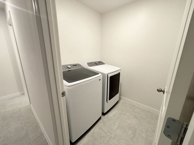 Furnished interior view inside a new home in Poinciana, Kissimmee (Image 4).