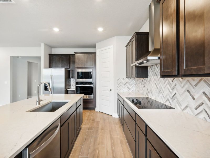 Kitchen in the Jade floorplan at 6358 Sweetwood Drive