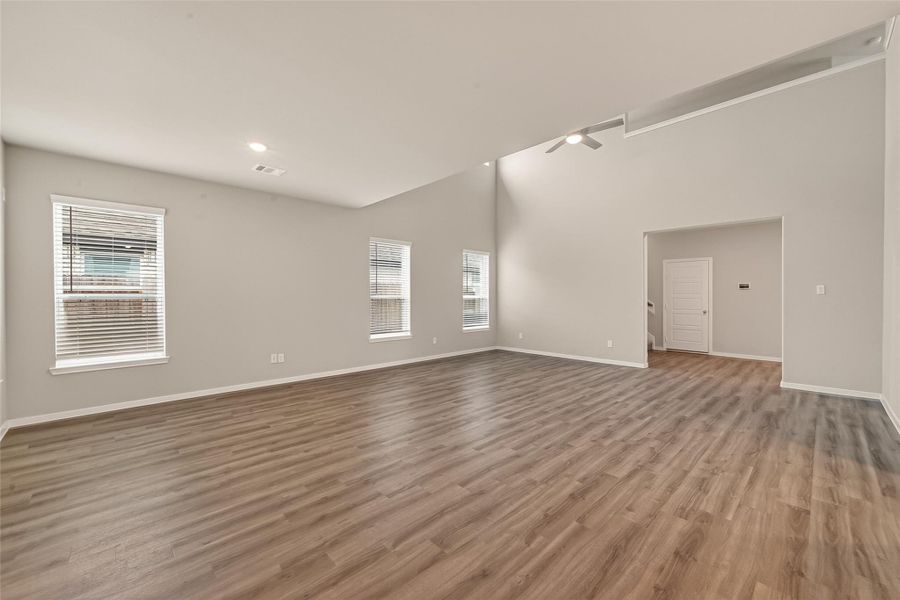 Spacious, unfurnished interior of a new home in Sunterra, Katy (Image 34).