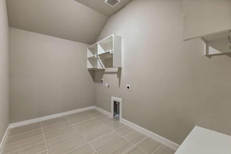 Utility Room in the Daltrey home plan by Trophy Signature Homes – REPRESENTATIVE PHOTO