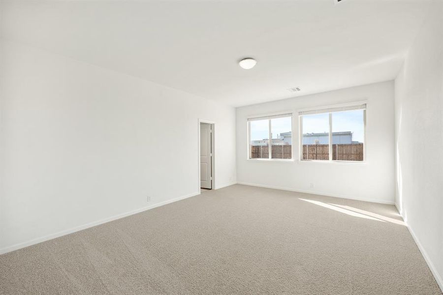 Spacious, unfurnished interior of a new home in East Oak Creek Elements, Commerce (Image 25).