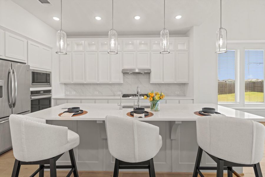 Your family and guests will enjoy many nights of fun, food and entertainment with ample counter space and kitchen island for setting up a wonderful array of provisions!