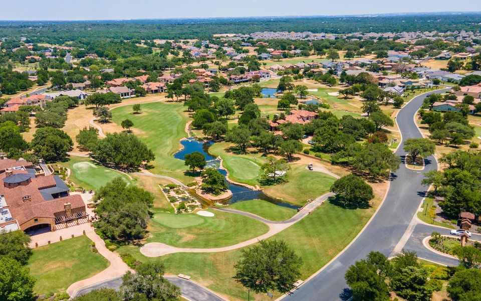 Aerial view featuring a residential view, view of golf course, and a water view