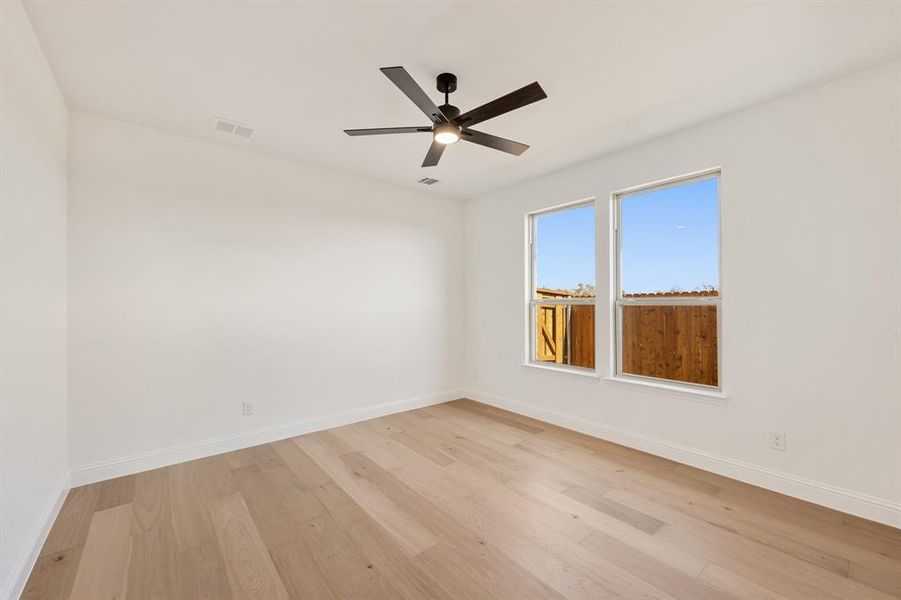 Spacious, unfurnished interior of a new home in Willow Wood Classic 50, McKinney (Image 35).