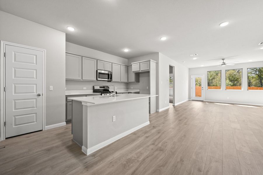 Kitchen in the Willow home plan by Trophy Signature Homes – REPRESENTATIVE PHOTO