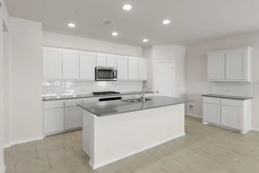 Representative exterior photo of a completed home built from the Lavon by Impression Homes in Creekshaw, Royse City, TX (Image 6). Representative exterior photo of a completed home built from the Lavon by Impression Homes in Creekshaw, Royse City, TX (Image 6).